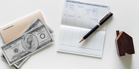 Dollar image with pen and paper